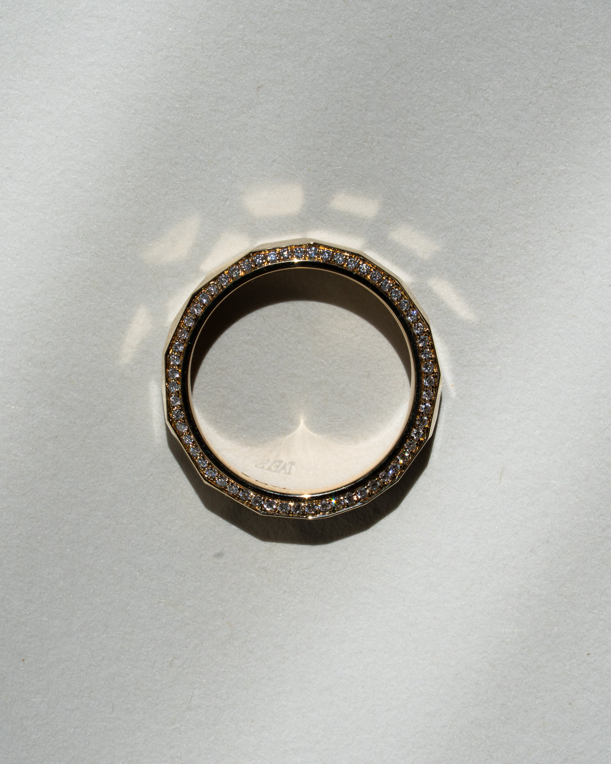 Hammered gold band with pavé diamonds