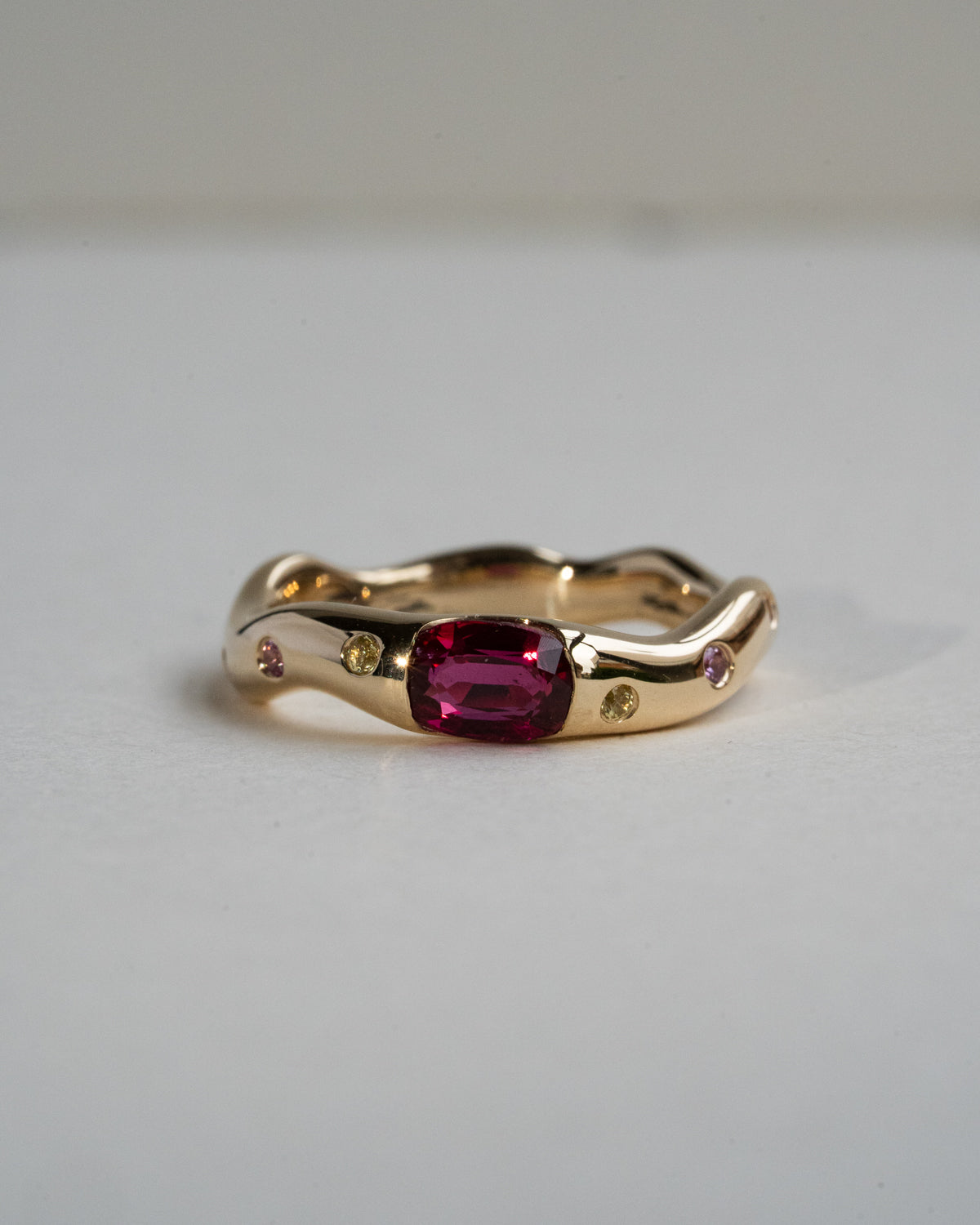 Oval Ruby with Scattered Sapphire Band