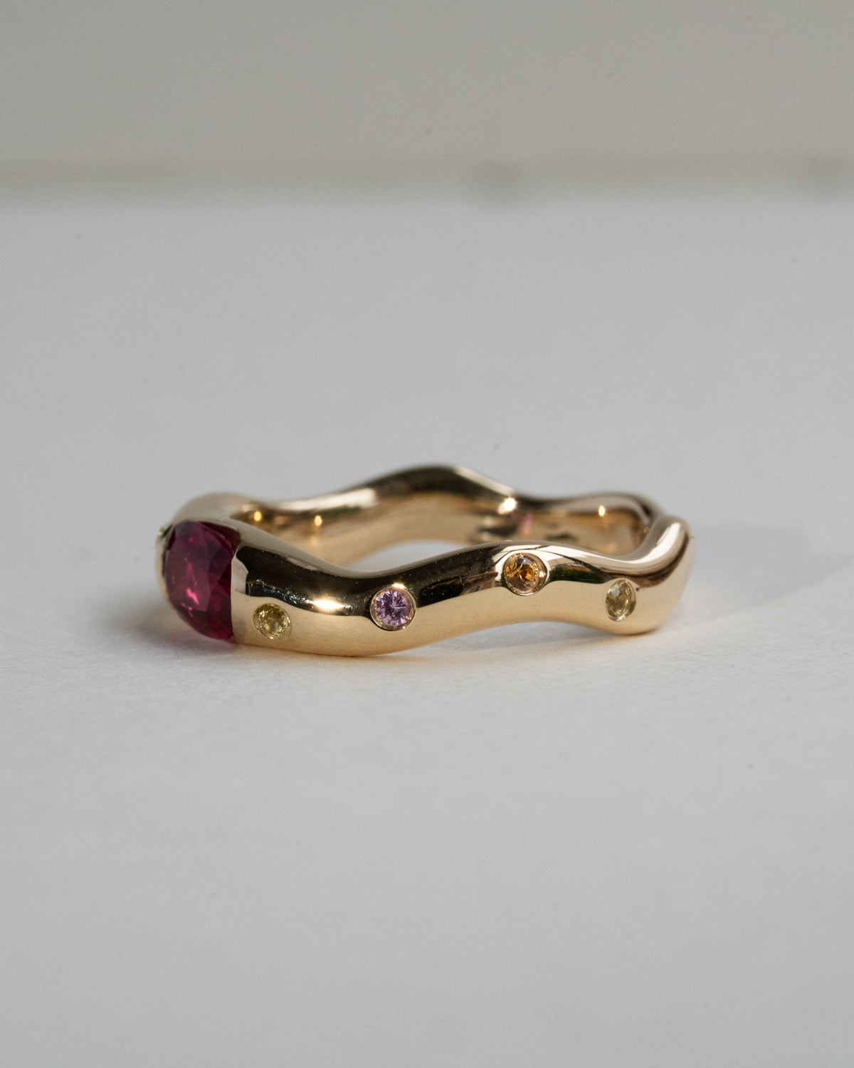 Oval Ruby with Scattered Sapphire Band