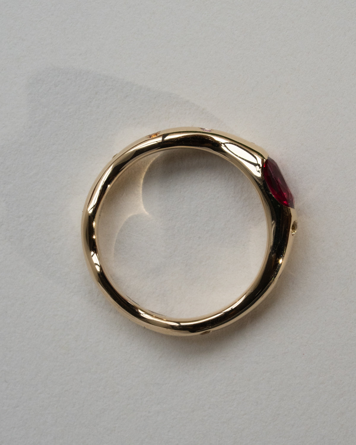 Oval Ruby with Scattered Sapphire Band