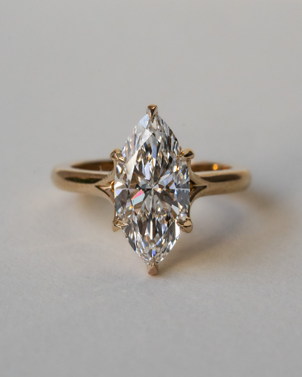 Marquise with Invisible Split shank and floral basket
