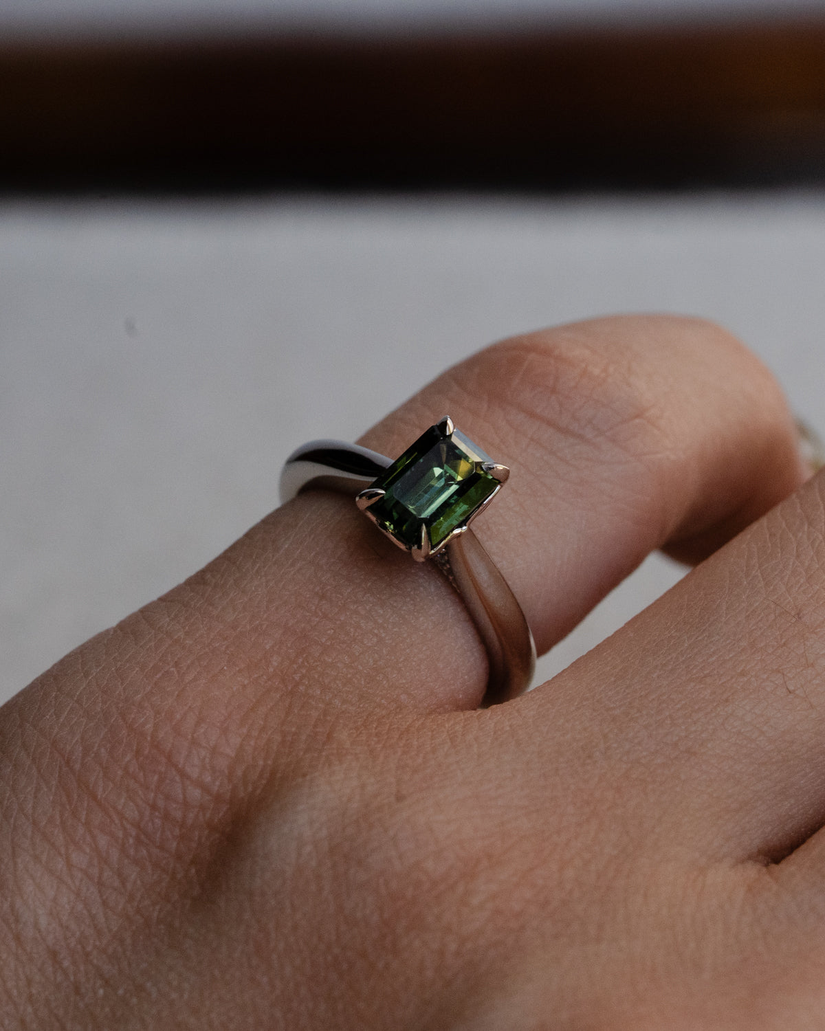 Parti sapphire with tulip basket setting