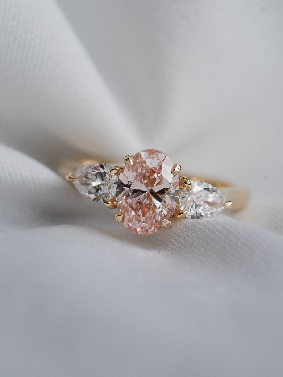 Pink Oval with Pear Side Stones Trilogy