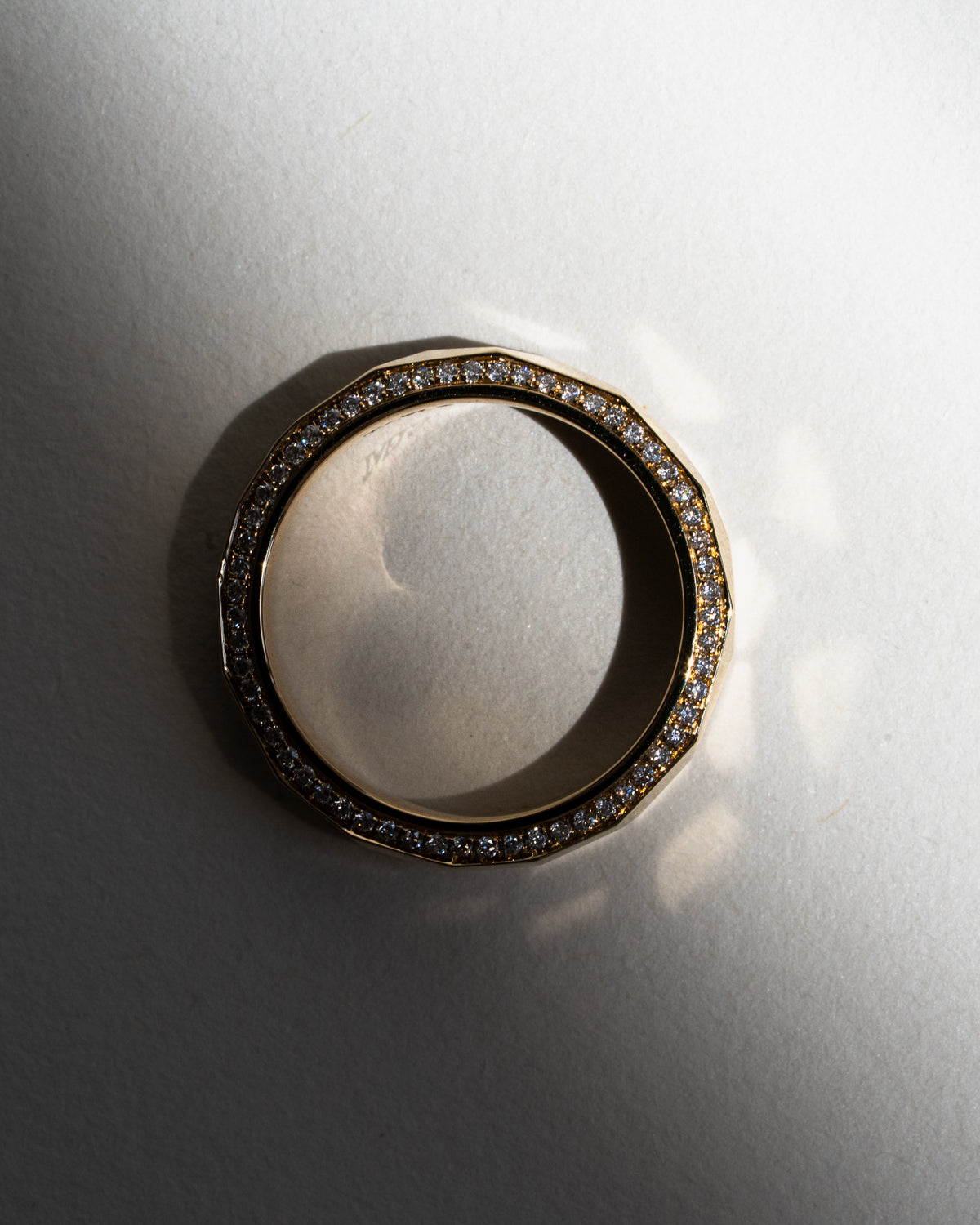 Hammered gold band with pavé diamonds