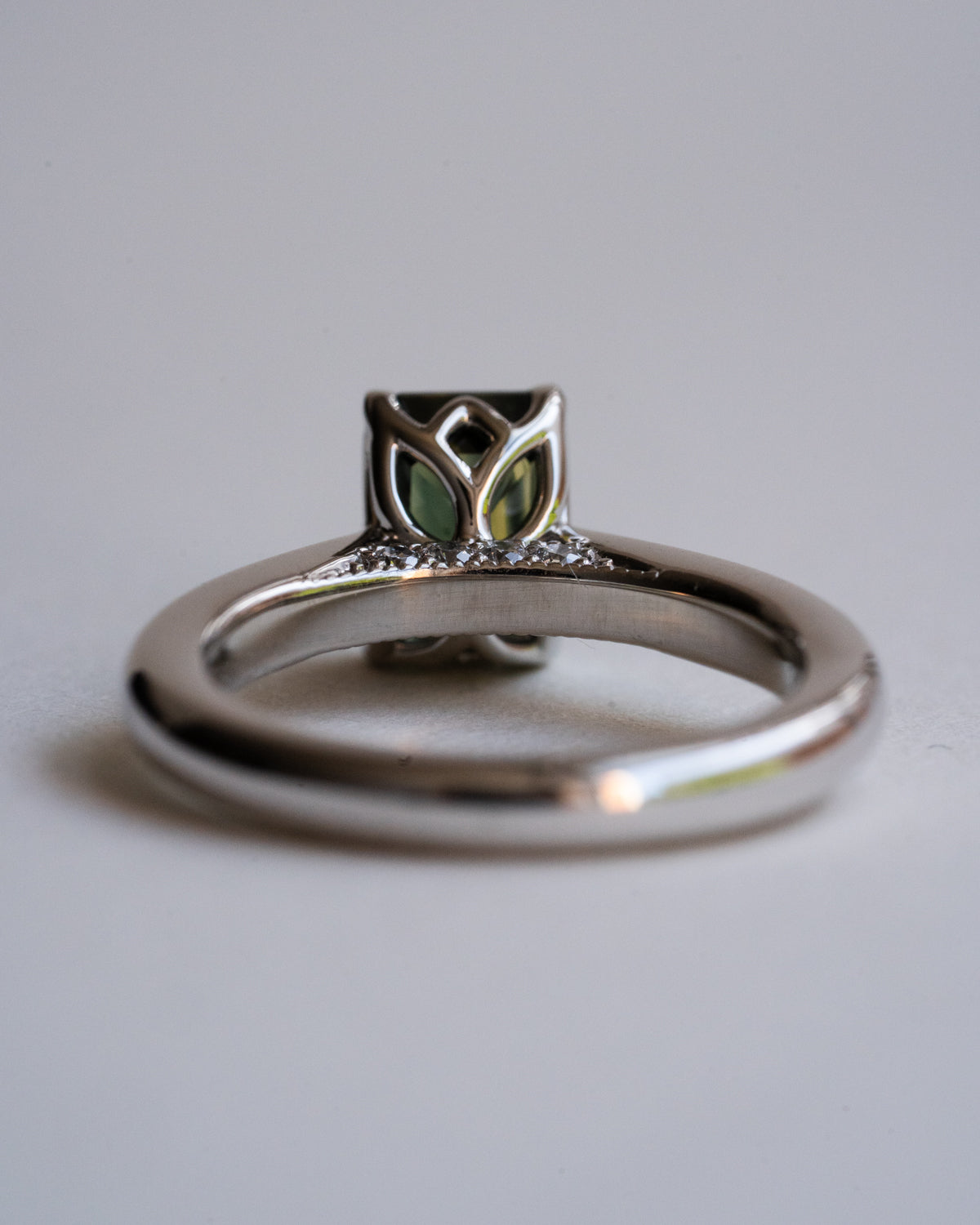 Parti sapphire with tulip basket setting