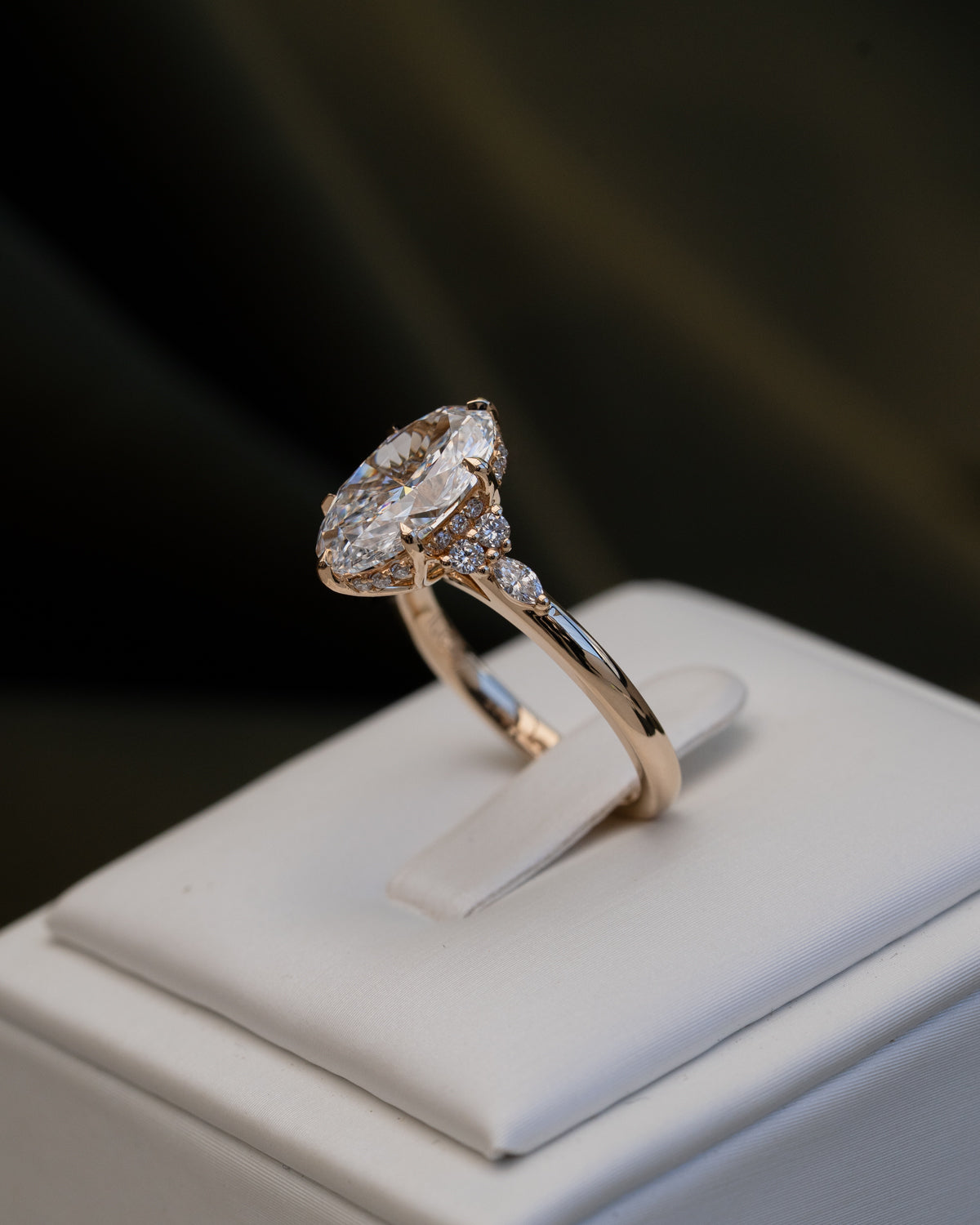 Oval Diamond with Round and Marquise Accent Stones