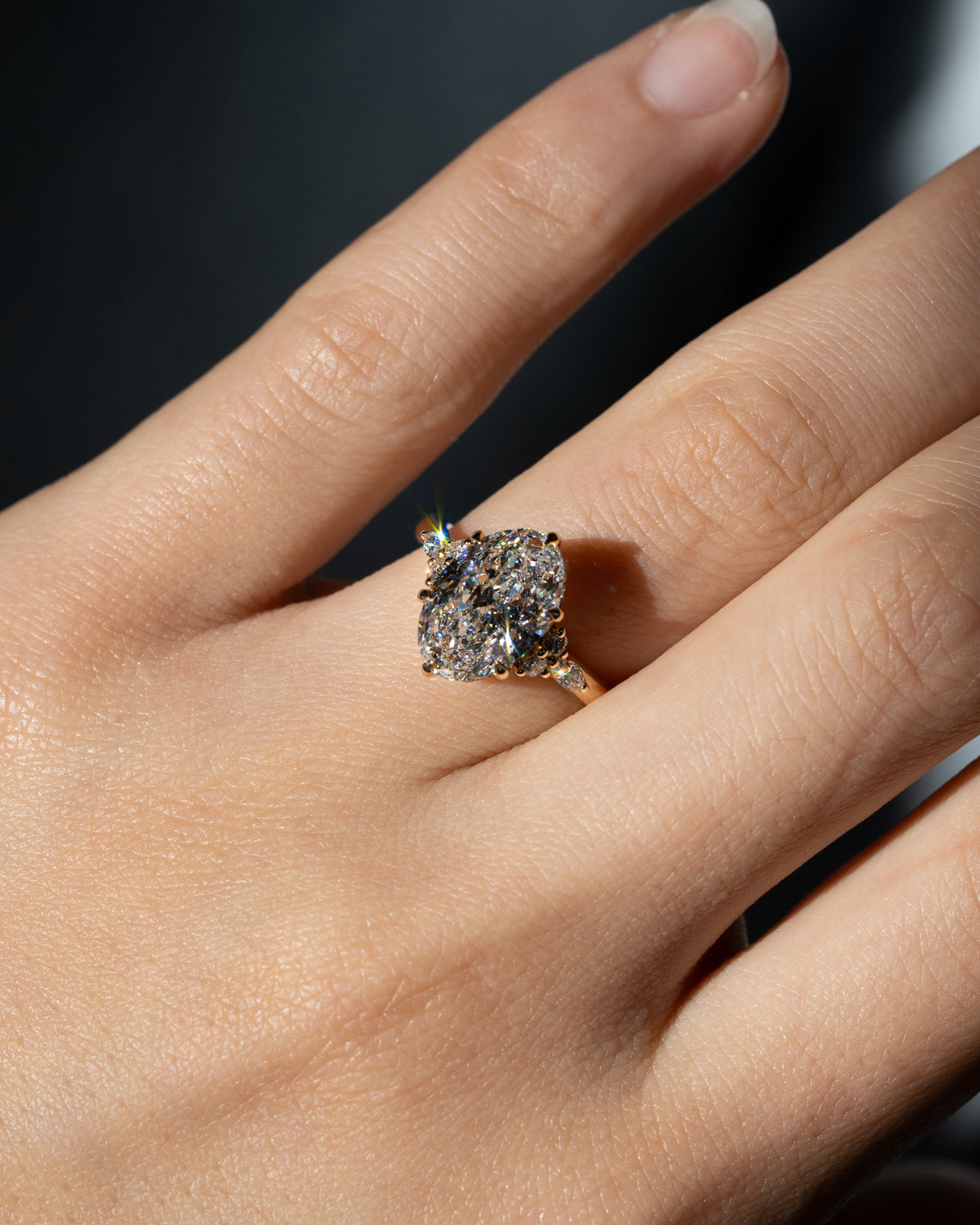 Oval Diamond with Round and Marquise Accent Stones
