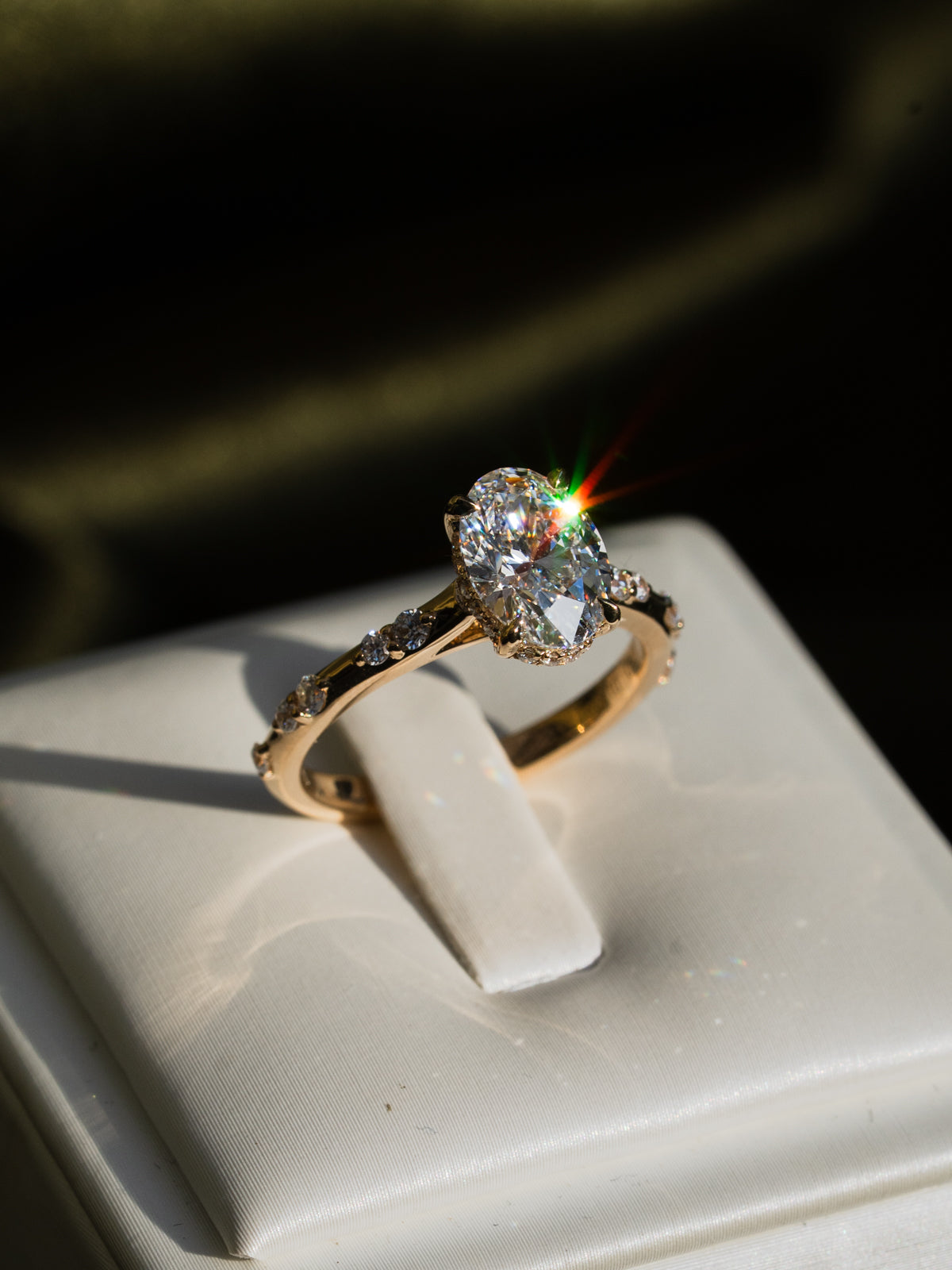 Oval Diamond Ring with Hidden Halo and Cathedral Setting